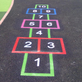 Wet pour surface with hopscotch